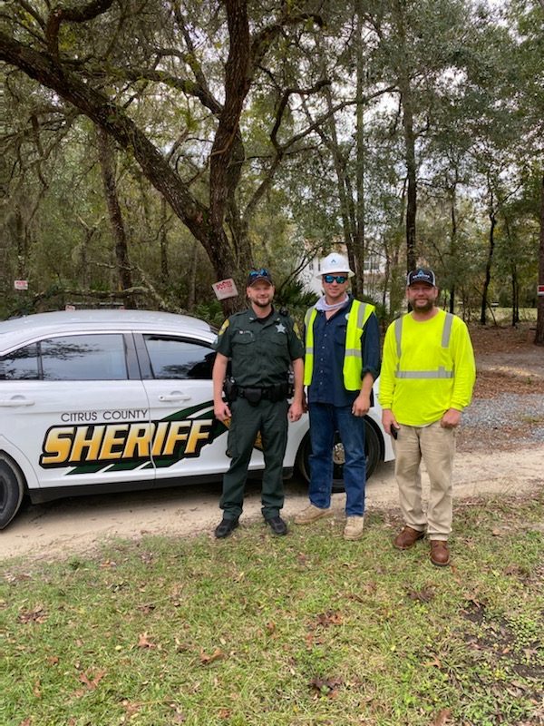 Sheriff with Two Agostino Utilities Workers